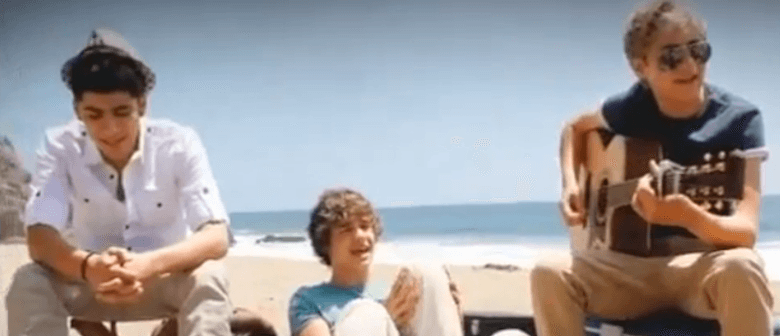 Watch One Direction covering Wonderwall on a beach