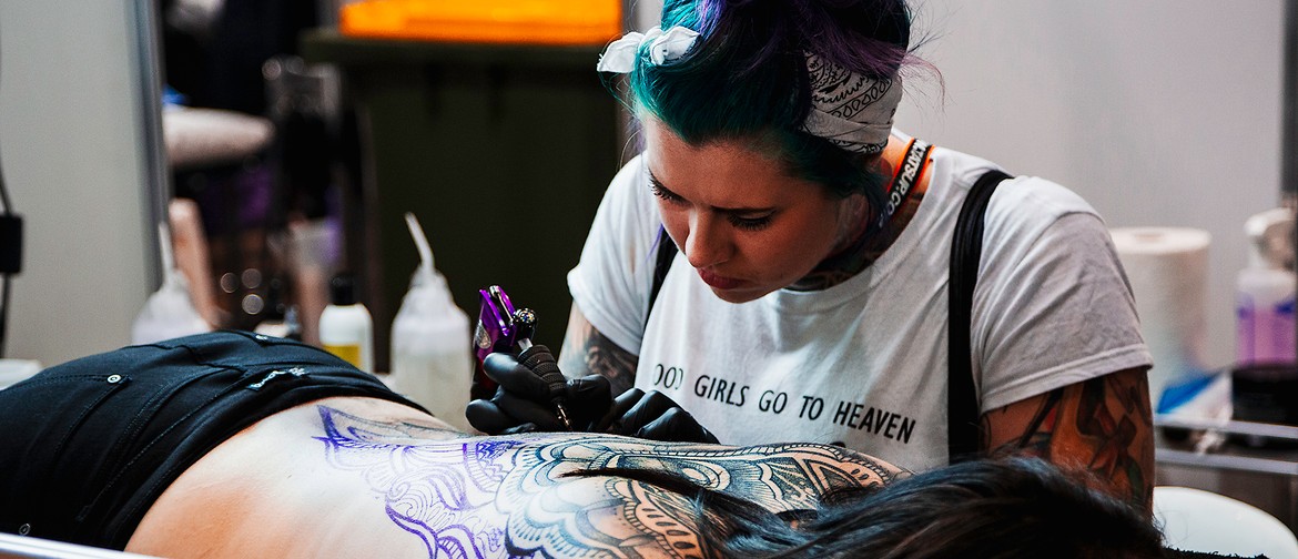 Tattoo artist Lorren Norrie works on a piece during the Australian... News  Photo - Getty Images