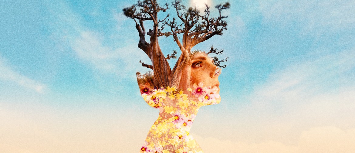 Side profile of female face. Her neck is made of blossoming flowers and her hair is made up of two trees growing towards the sky. She looks off into the distance
