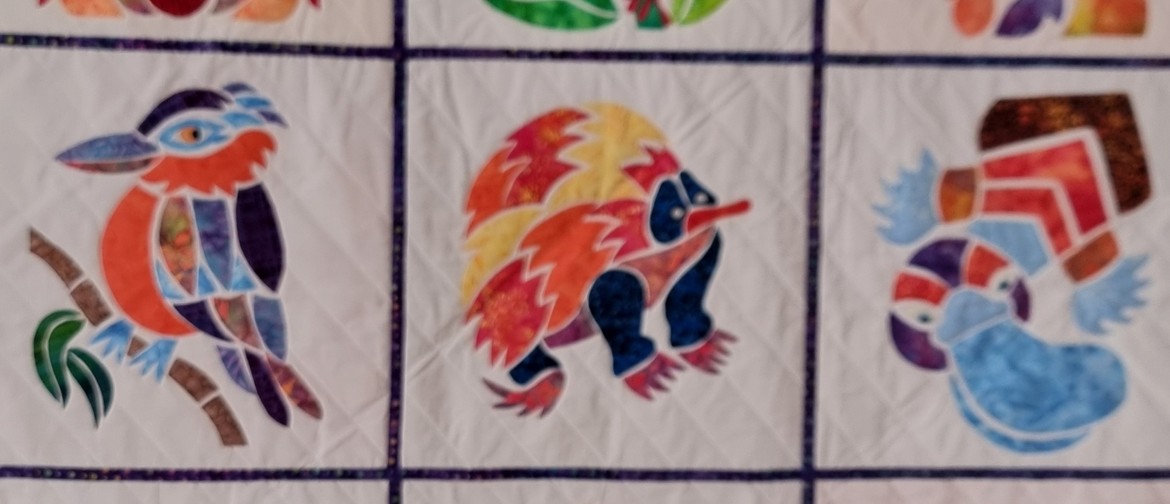 2025 Caloundra Quilters Biennial Quilt Show Section of a raffle prize quilt showing appliqued Australian animals
