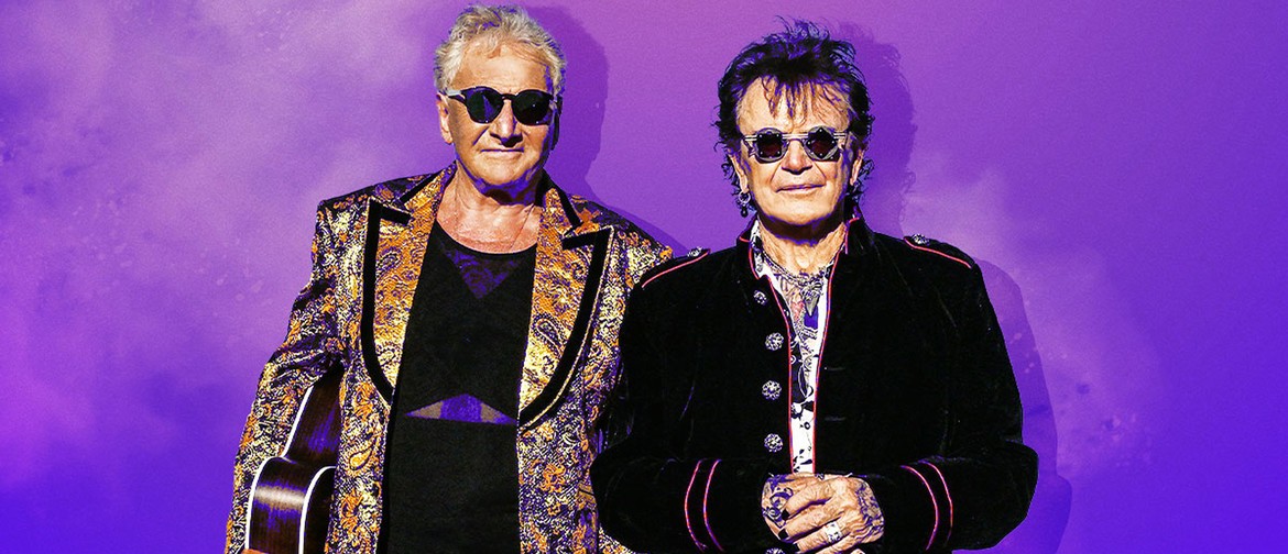 Air Supply – 50th Anniversary Celebration Graham Russell and Russell Hitchcock of Air Supply standing in front of a purple backdrop