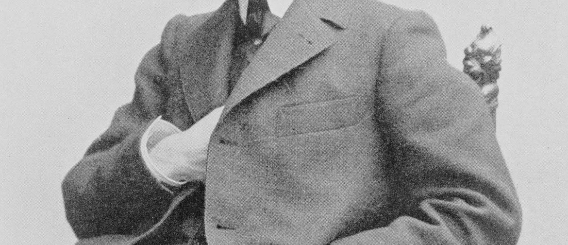 Discover Sibelius Side by Side with MYO A black and white photo of a seated mans torso, dressed in a suit with one hand reaching into their inner breast pocket