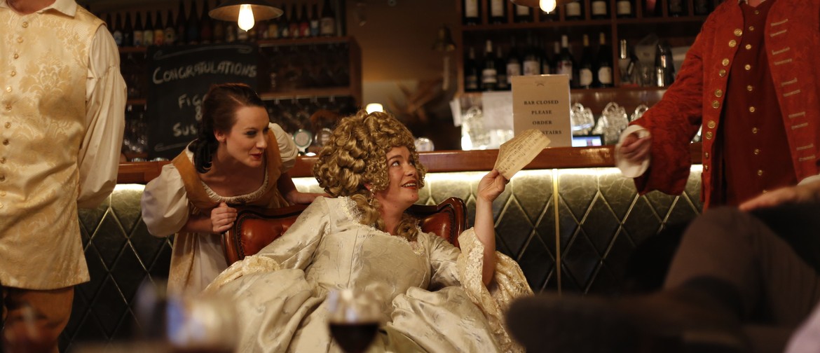 Costumed opera singers performing in a pub
