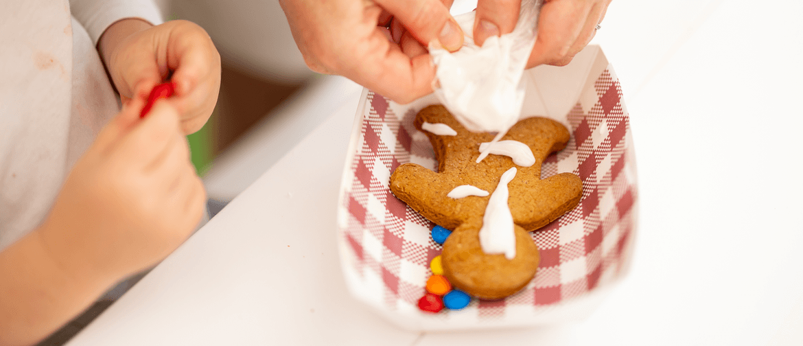 Sweet young girl and smiling Christmas Elves crafting at Christmas in Broadbeach